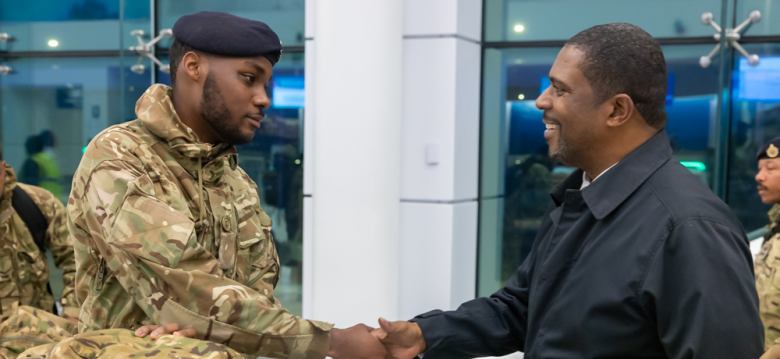Minister Weeks Visits Airport to See Off Royal Bermuda Regiment Troops Deploying to Jamaica